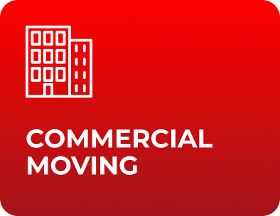 Office furniture and equipment being loaded into a moving truck for a commercial relocation
