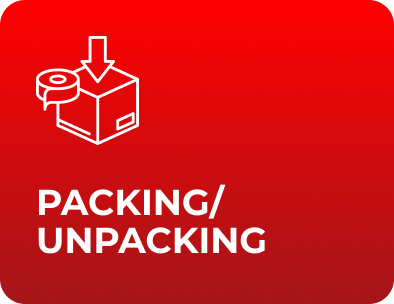 Movers carefully packing household items into boxes and labeling them for unpacking