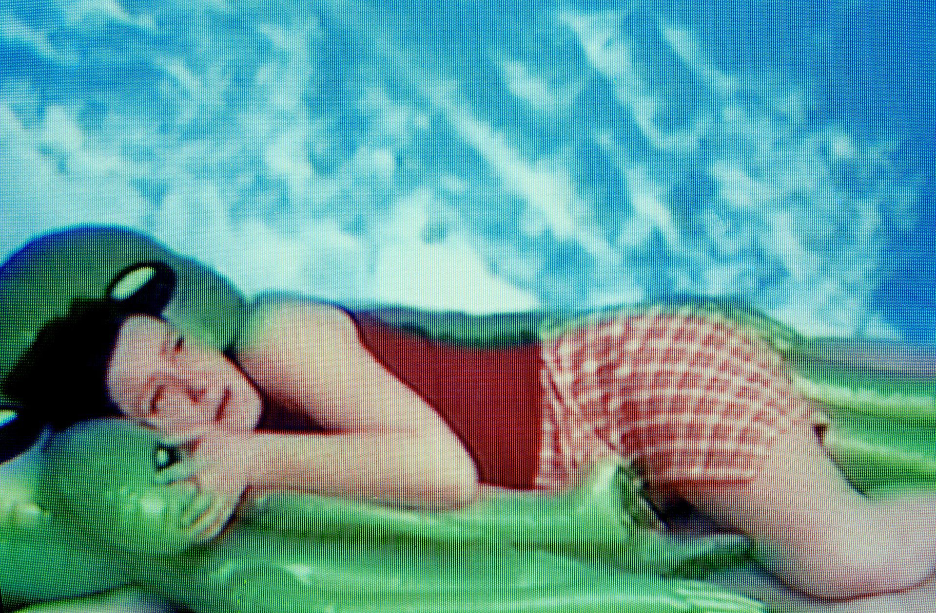 Henriette Thorslund Video-still from Miss Tigra and the Gabriel-mutating Aliens Trip to Toyland - kamera + blue screen + visuals by Patrick Munck