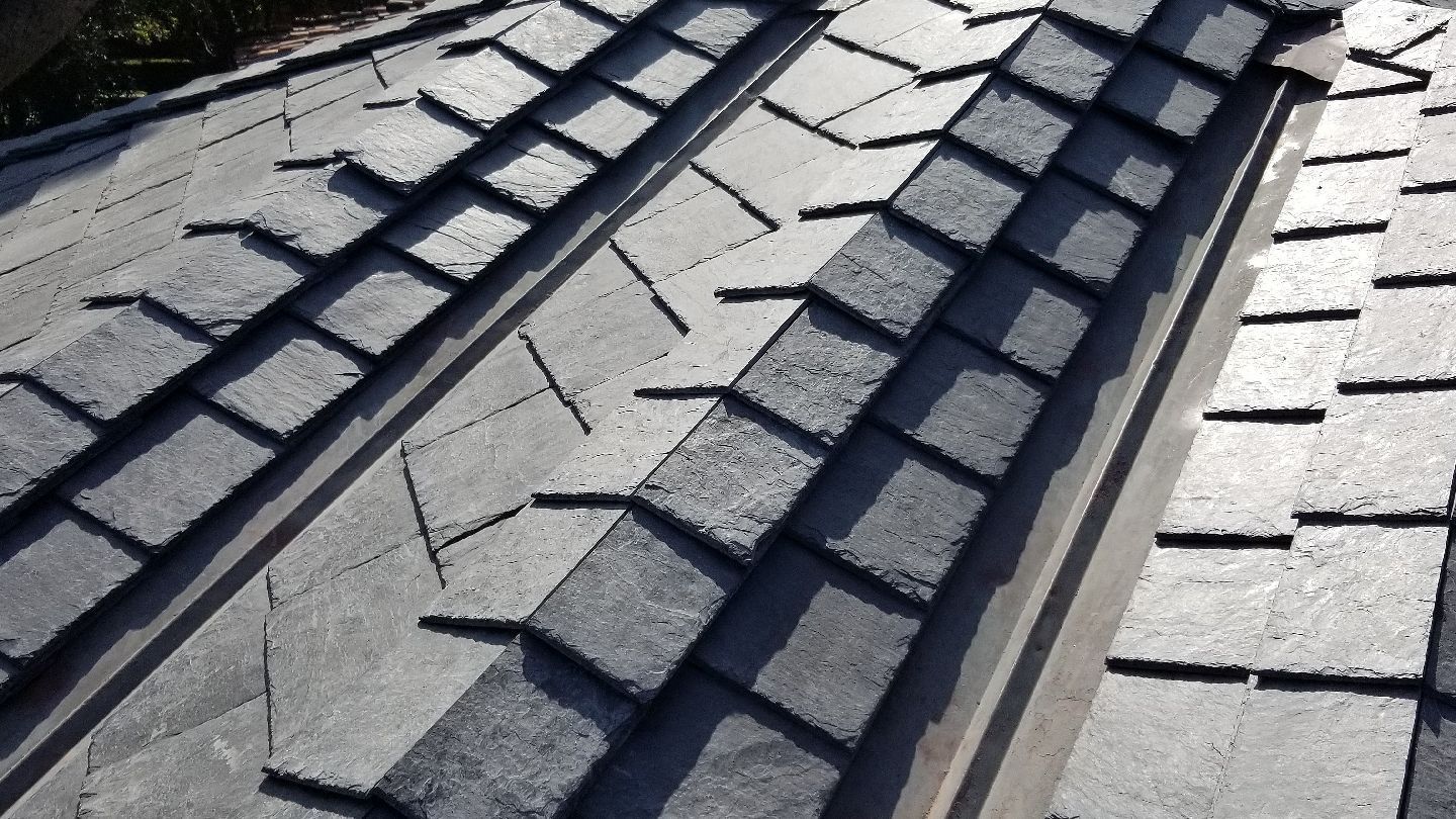 A close up of a tire track on a roof