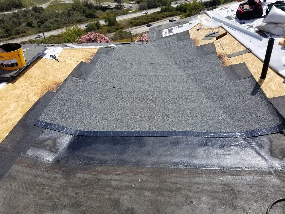 A roof is being installed on top of a building.