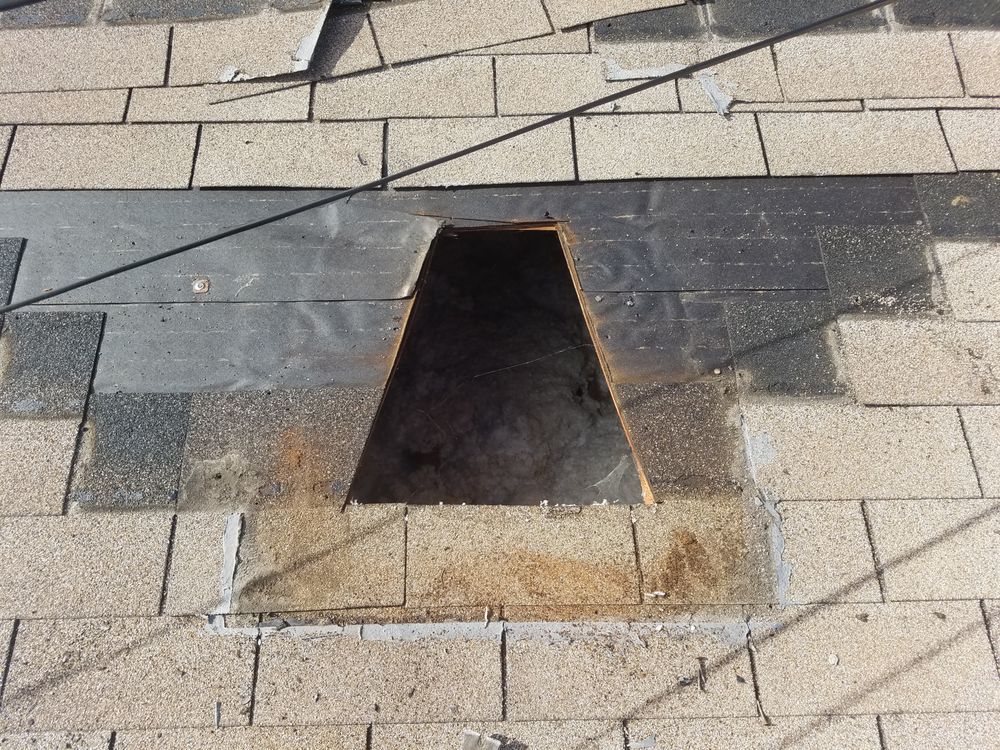 A hole in the roof of a building
