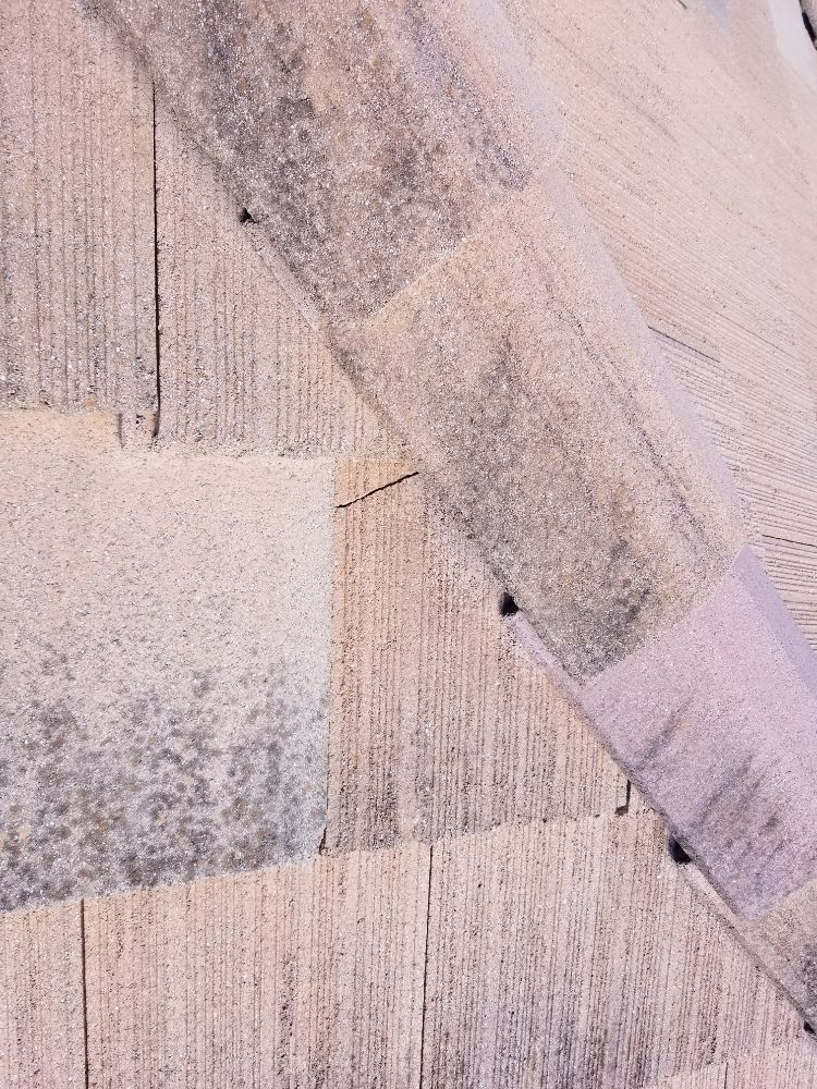 A close up of a piece of wood on a wall.