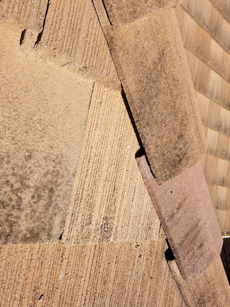 A close up of a piece of wood with a hole in it.