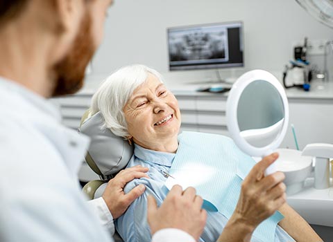 Elderly Woman in the Dental Office — Grand Rapids, MI — Dentures In a Day