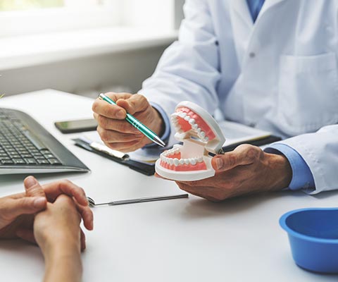 Dentist and Patient Discussion — Grand Rapids, MI — Dentures In a Day