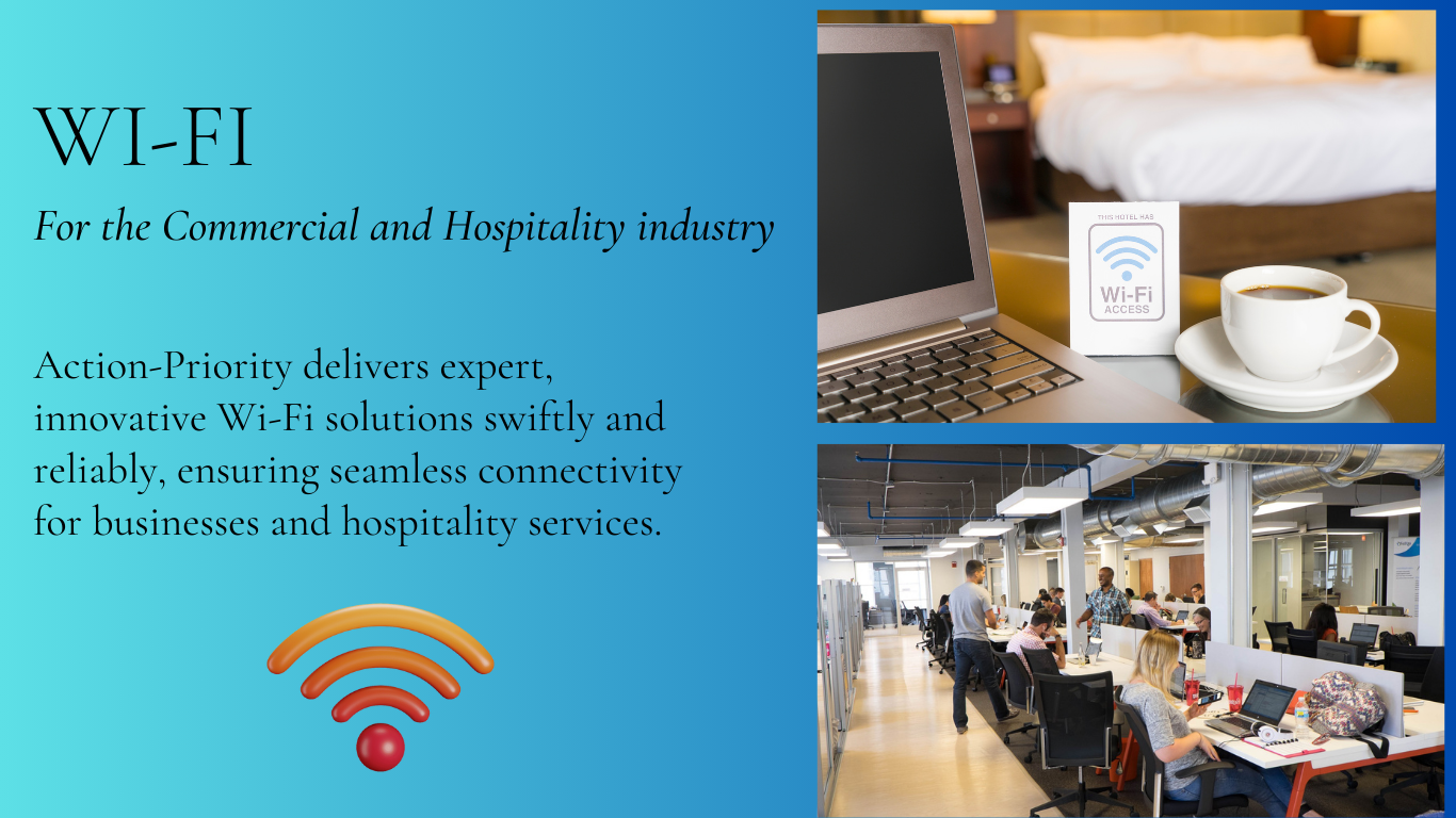 White router with antennas on a wooden desk with a laptop, hands typing on the keyboard in the background.