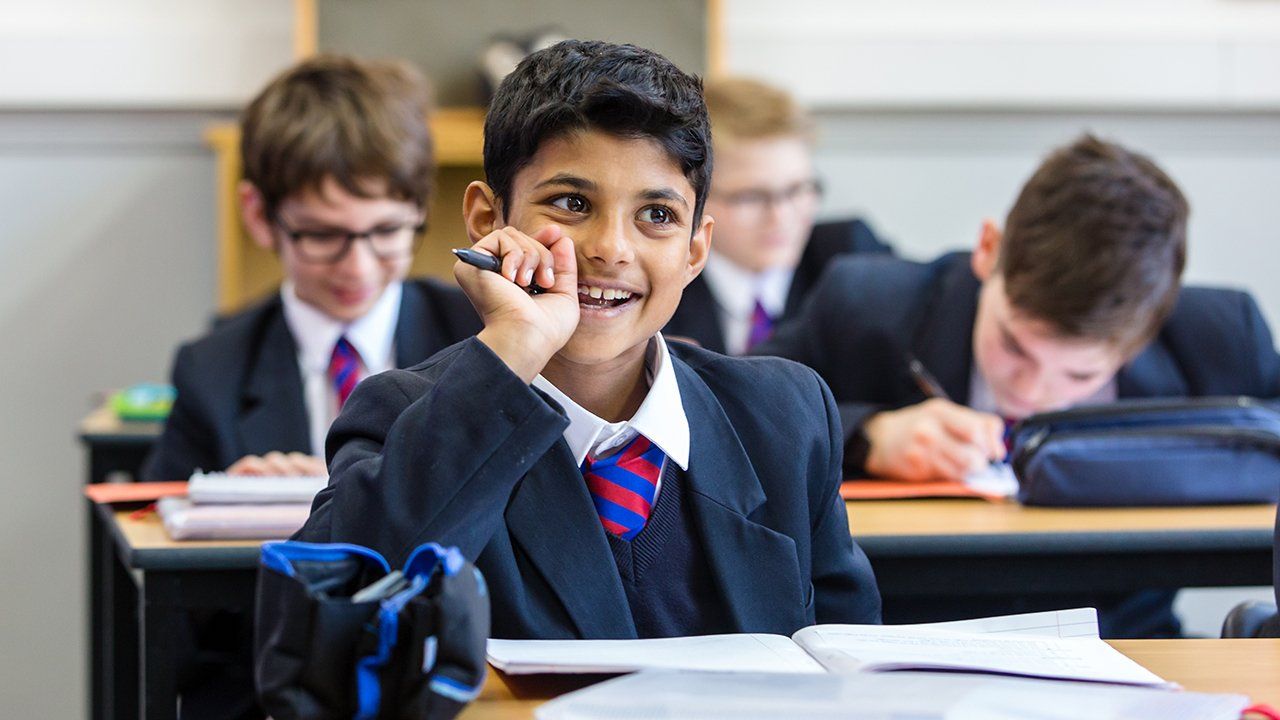 Professional photographer near me boy in class