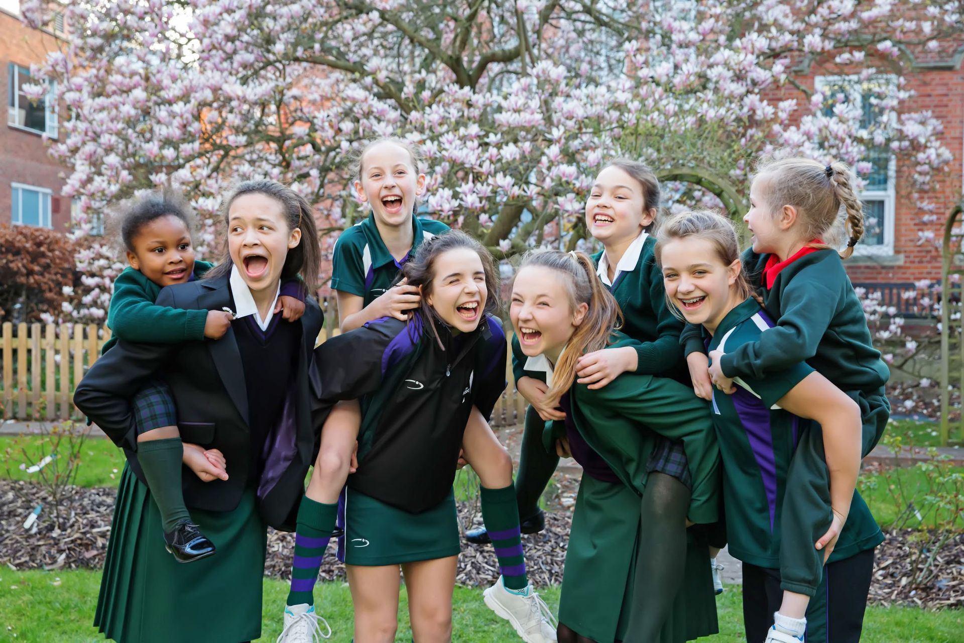 Professional photographer Reading  pupils laughing