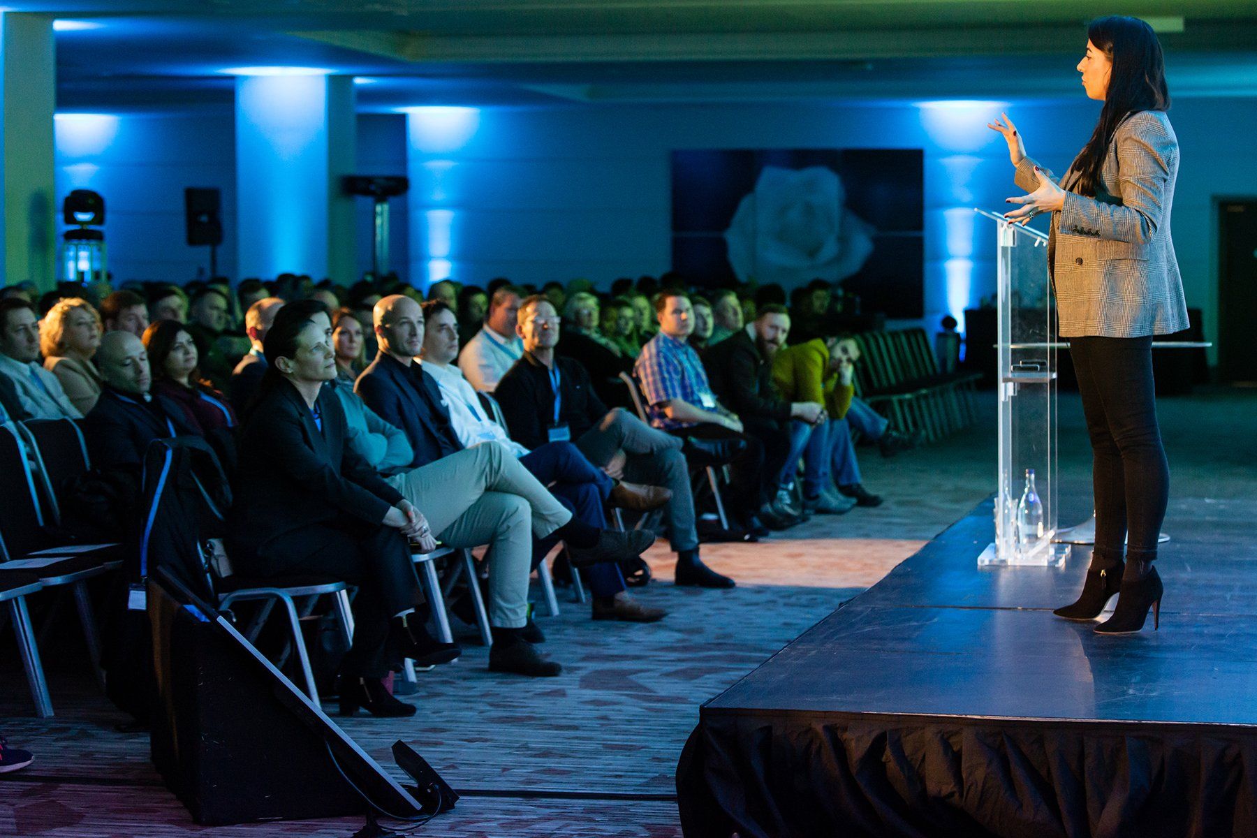 Professional photographer near me female presenting at large event