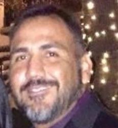 Headshot of Adan Aguillon.