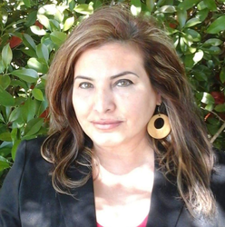 Headshot ot Olga Garza.