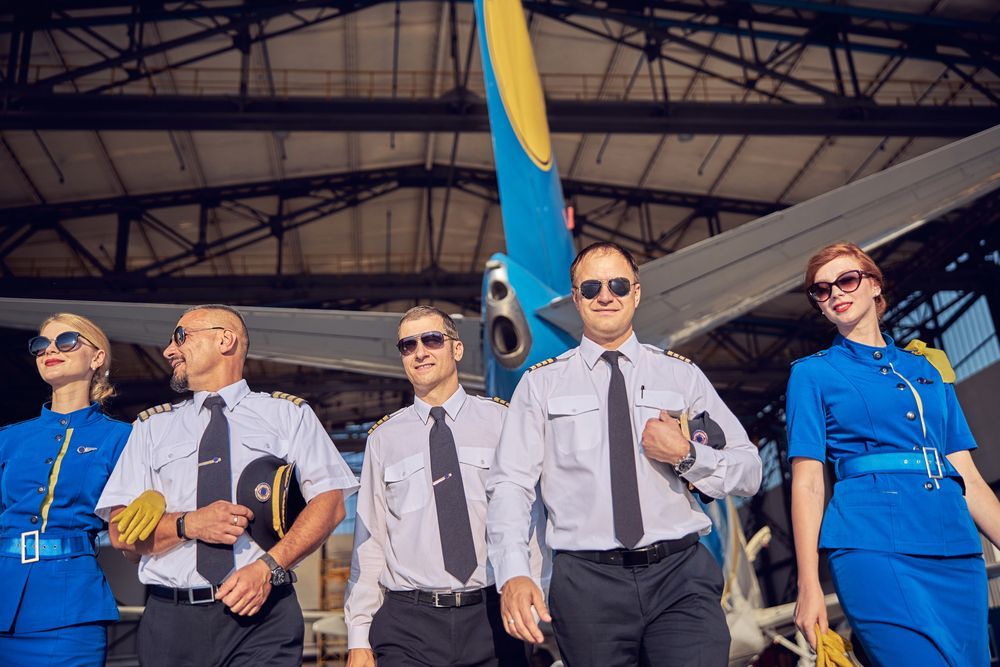 Employed pilots at a hangar.