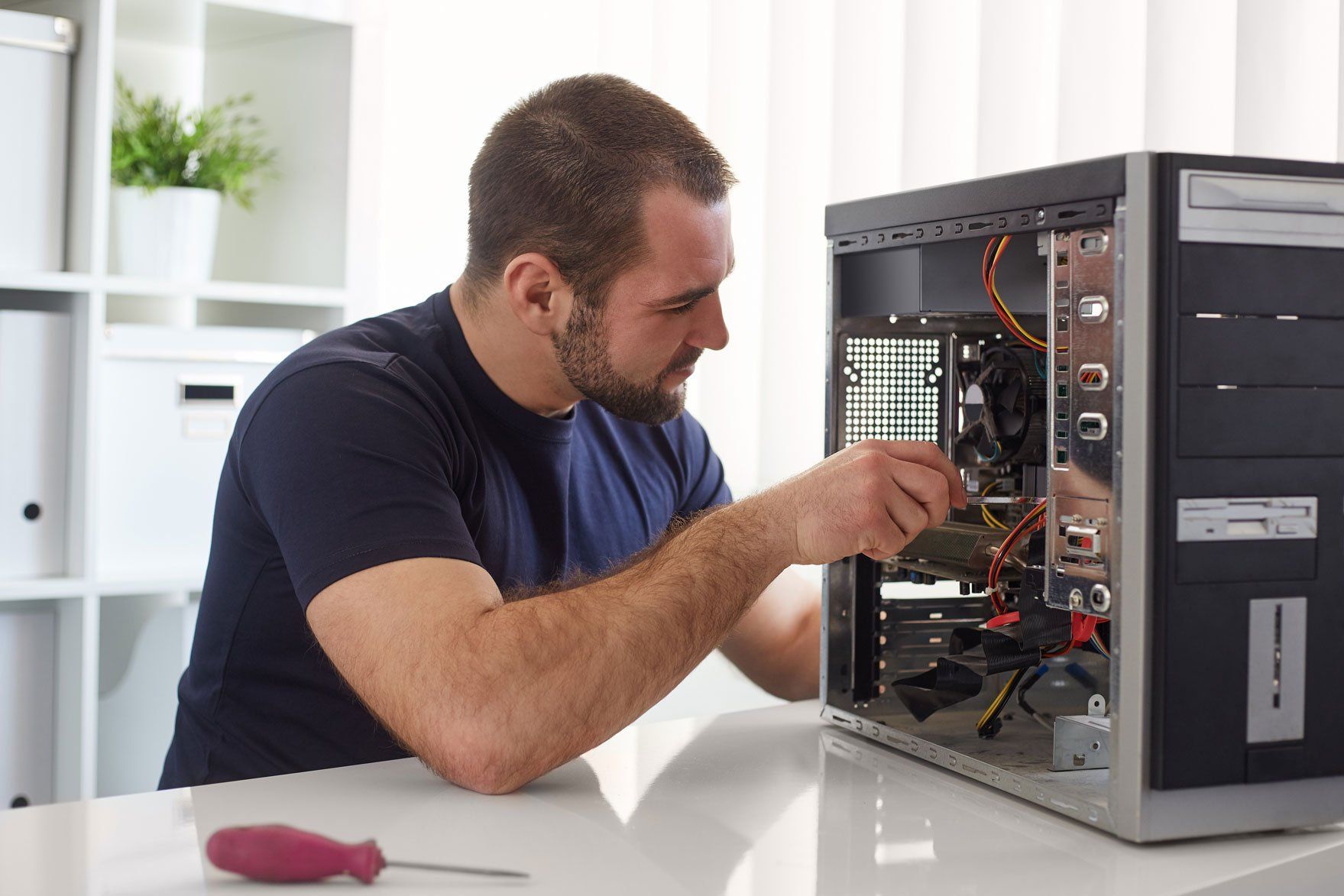Man Doing Troubleshoot in A Computer — Morehead City, NC — On-Site Computing Tech, LLC