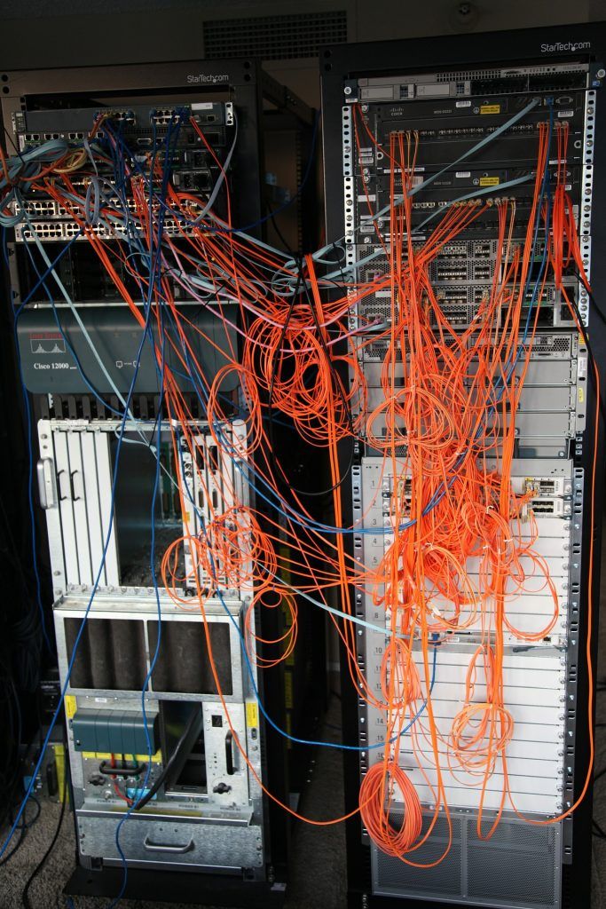 Cables in Server Rack — Morehead City, NC — On-Site Computing Tech, LLC Cables in Server Rack — Morehead City, NC — On-Site Computing Tech, LLC
