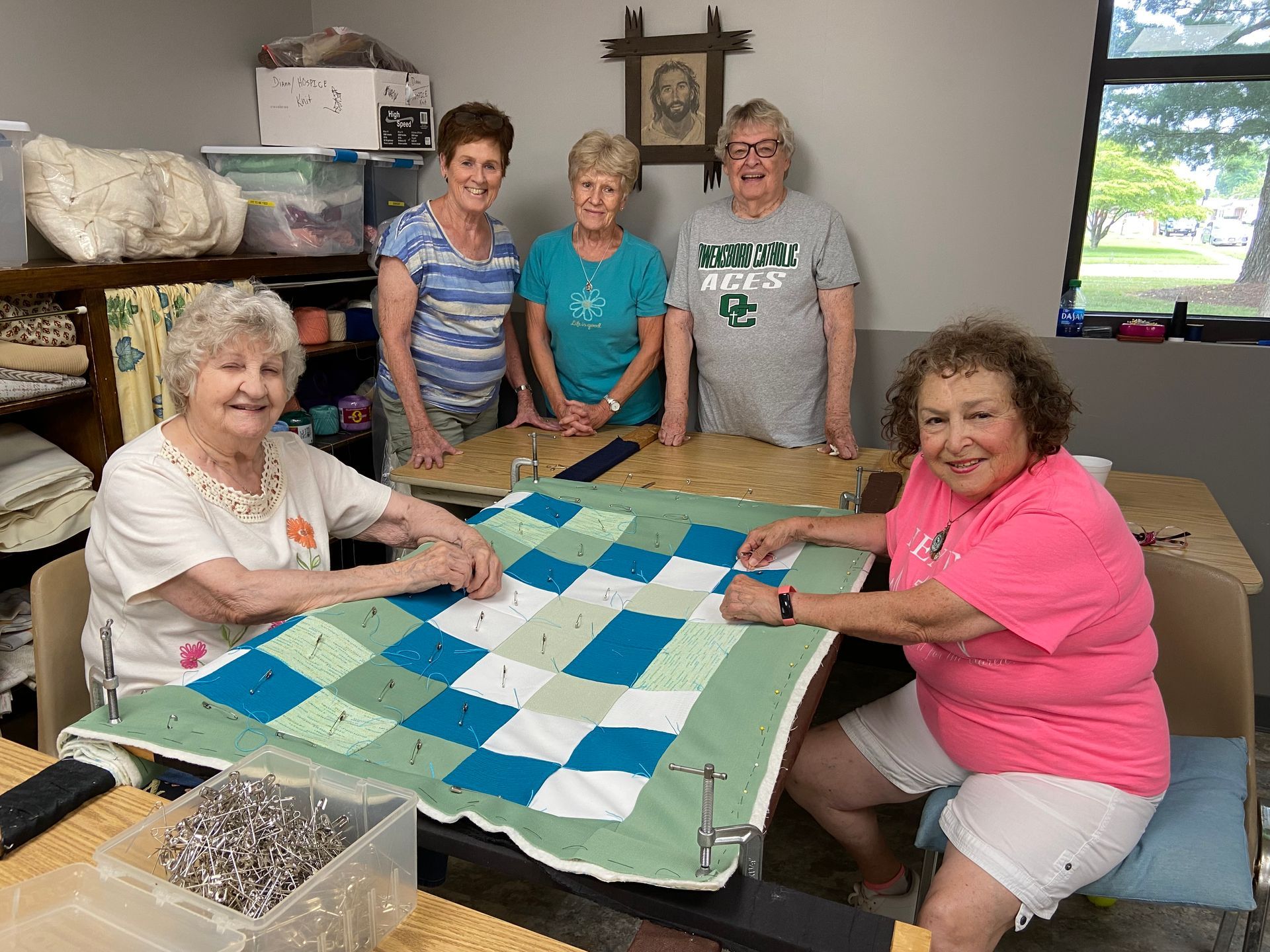 Volunteers quilting