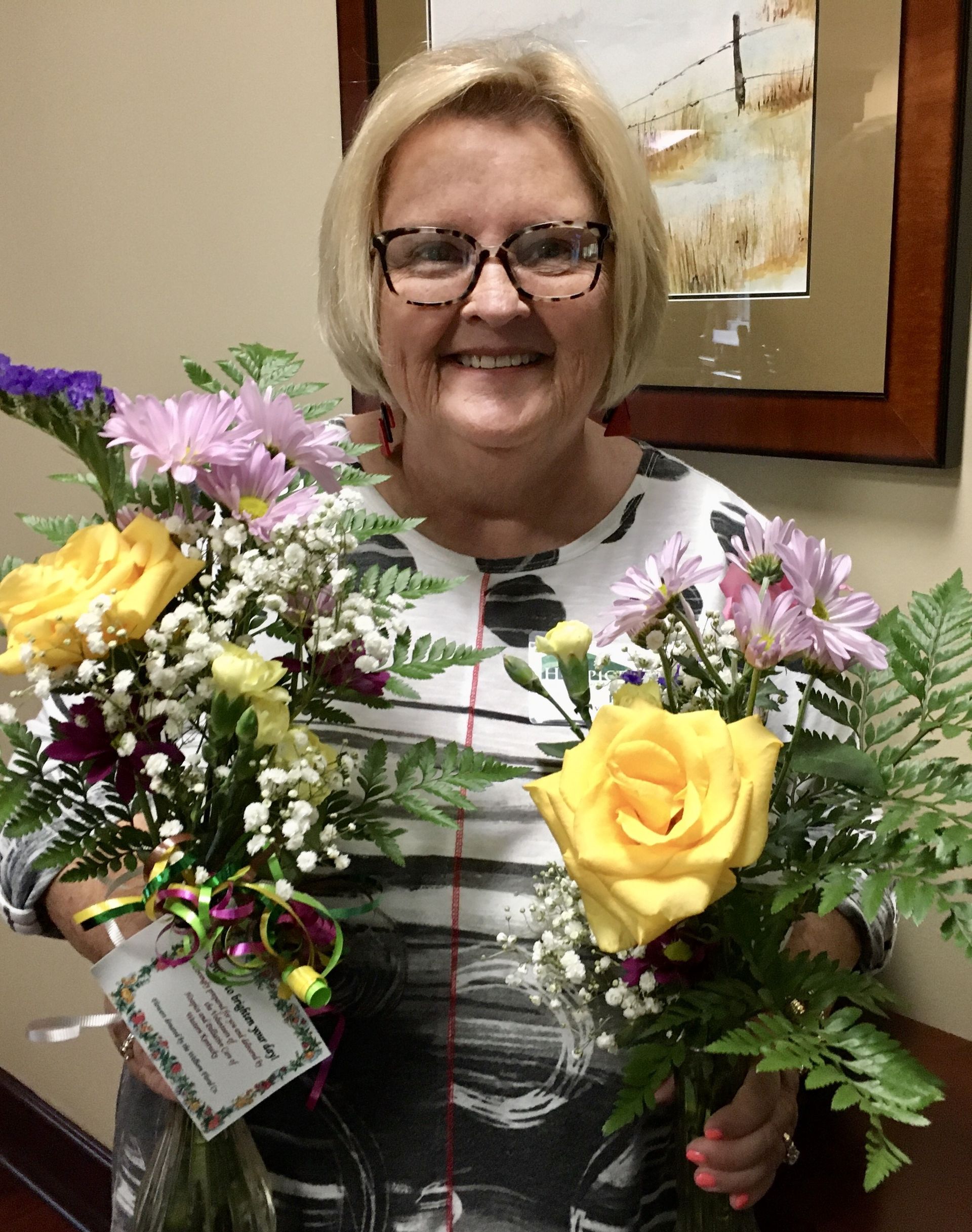 Volunteer with bouquet