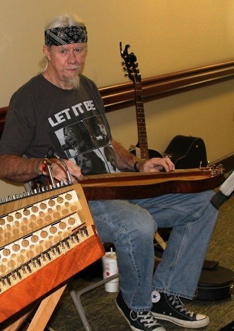 Volunteer playing music