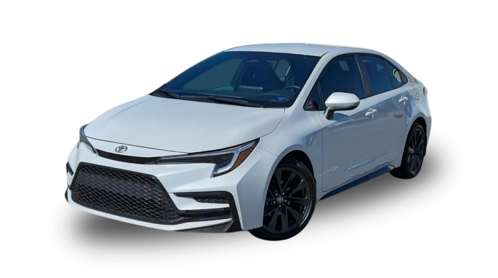 A white Toyota Corolla sedan viewed from the front passenger side against a white background.