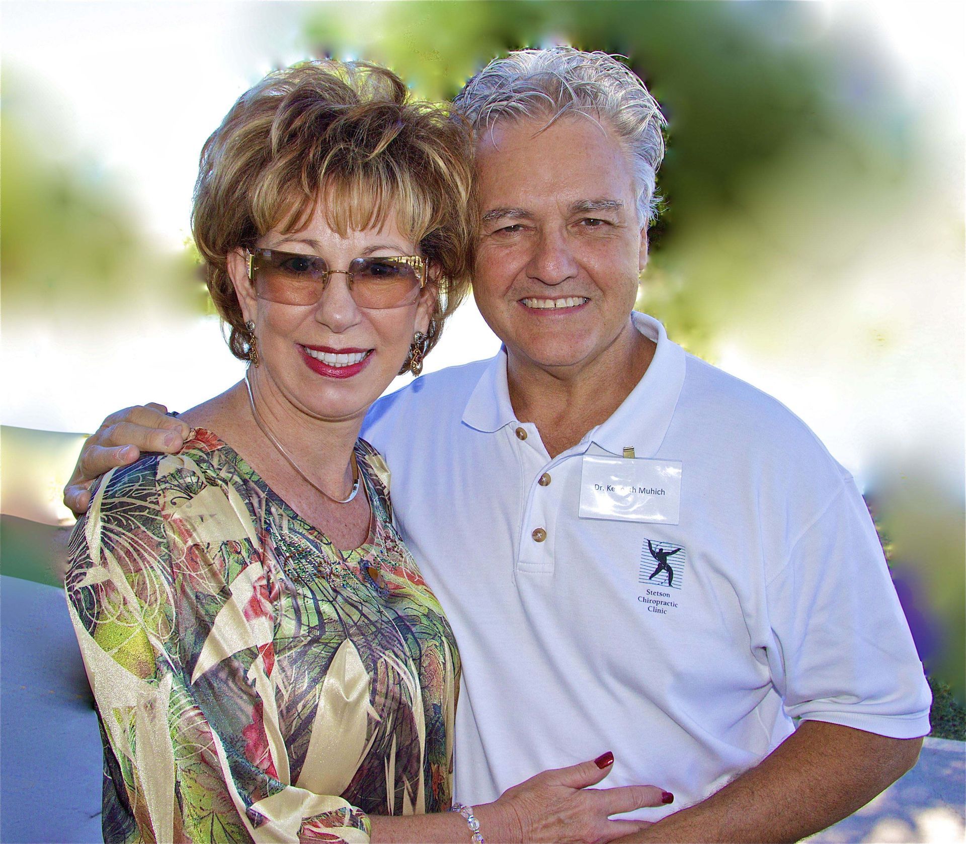 A man and a woman are posing for a picture together