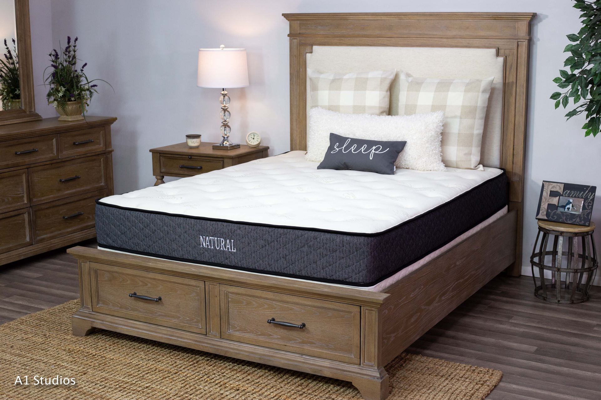 A bed with a mattress on top of it in a bedroom.