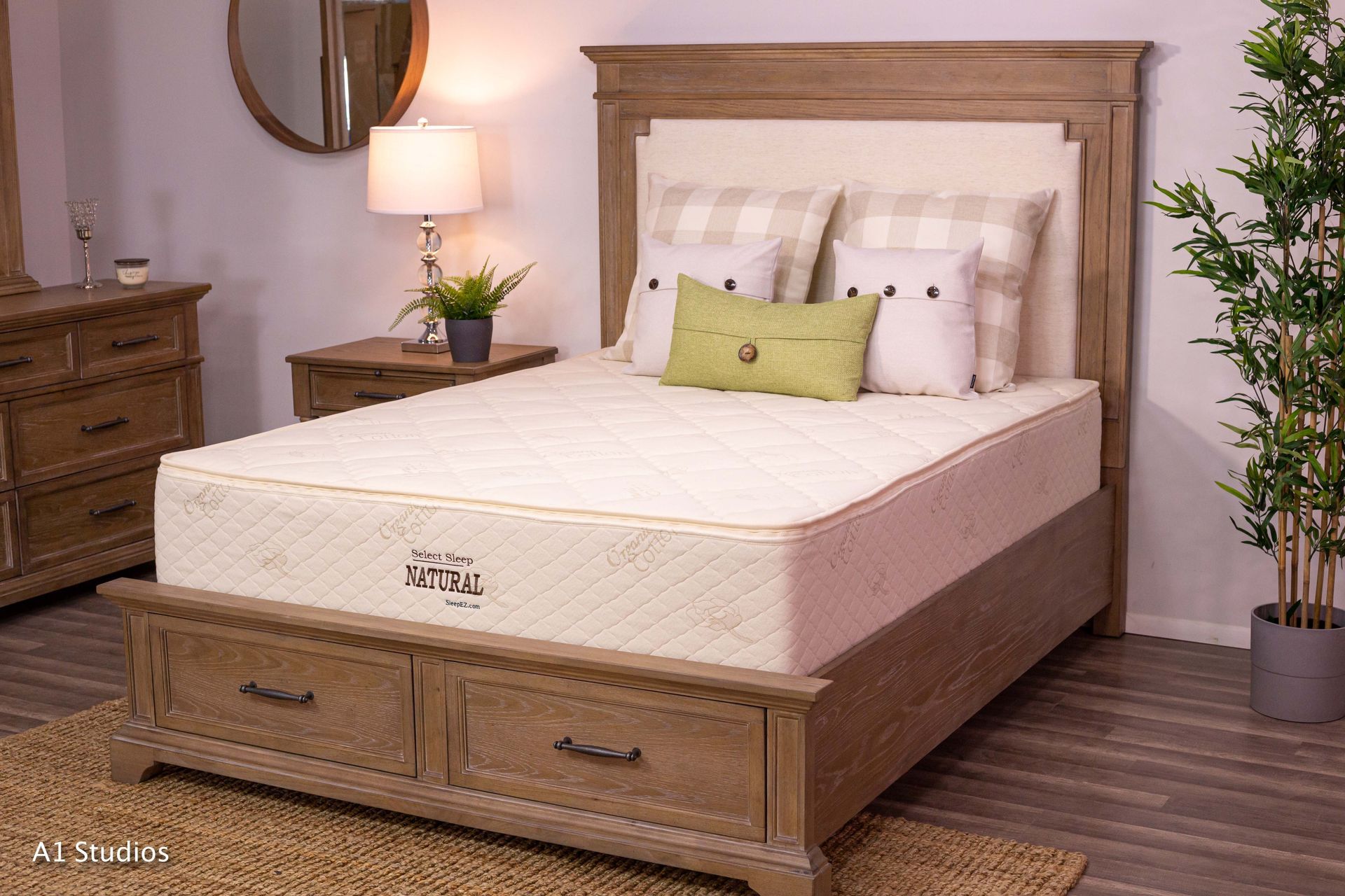 A bed with a mattress on top of it in a bedroom.