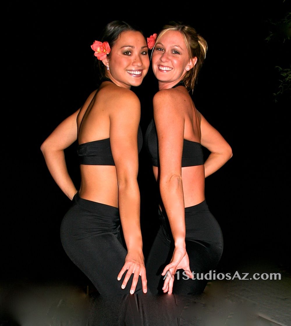 Two women standing next to each other with studiosaz.com in the corner