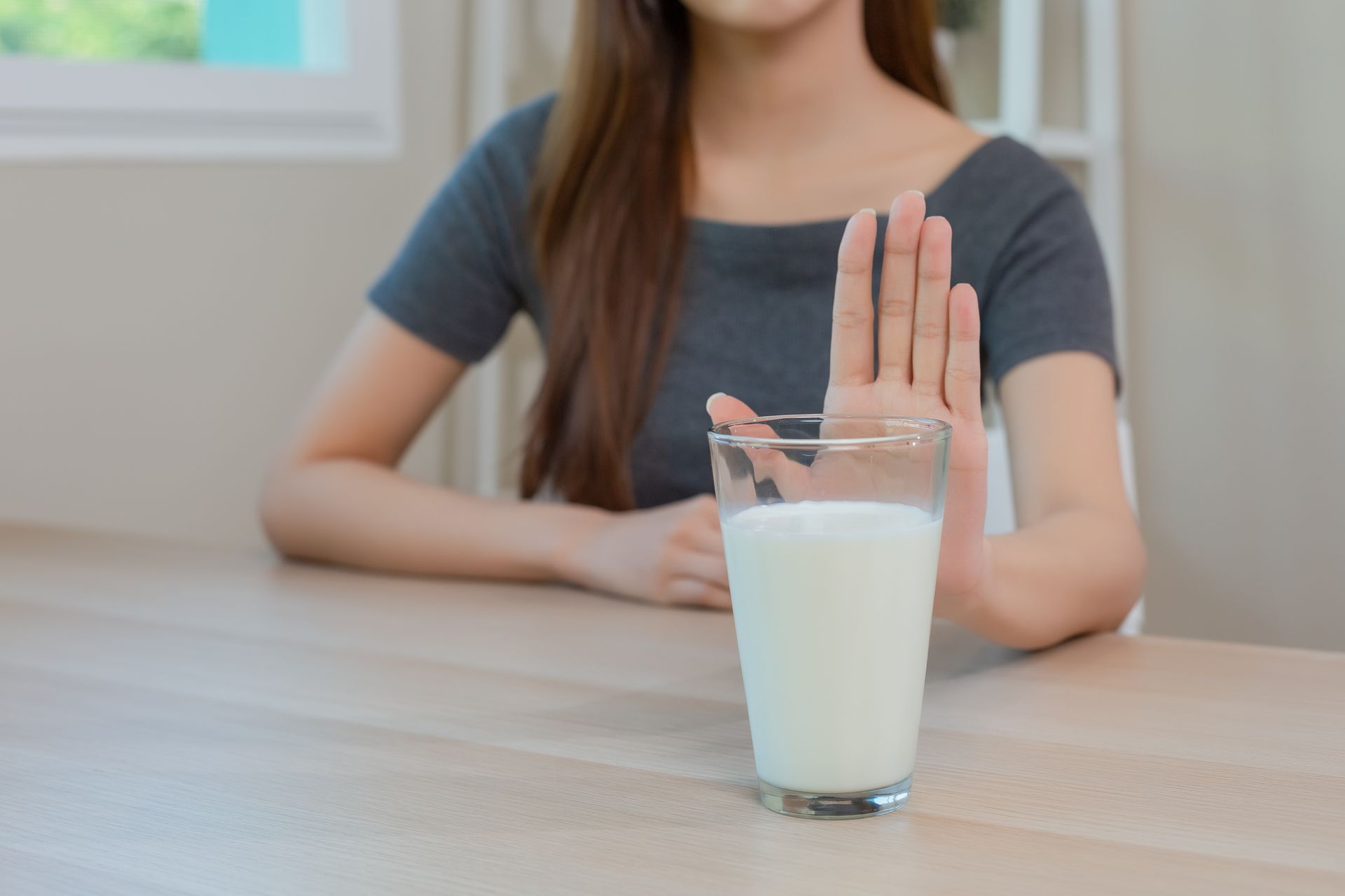 Woman refusing to drink Milk
