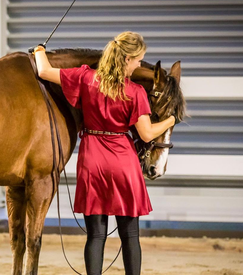 photo of kassie connecting with her horse Rossy