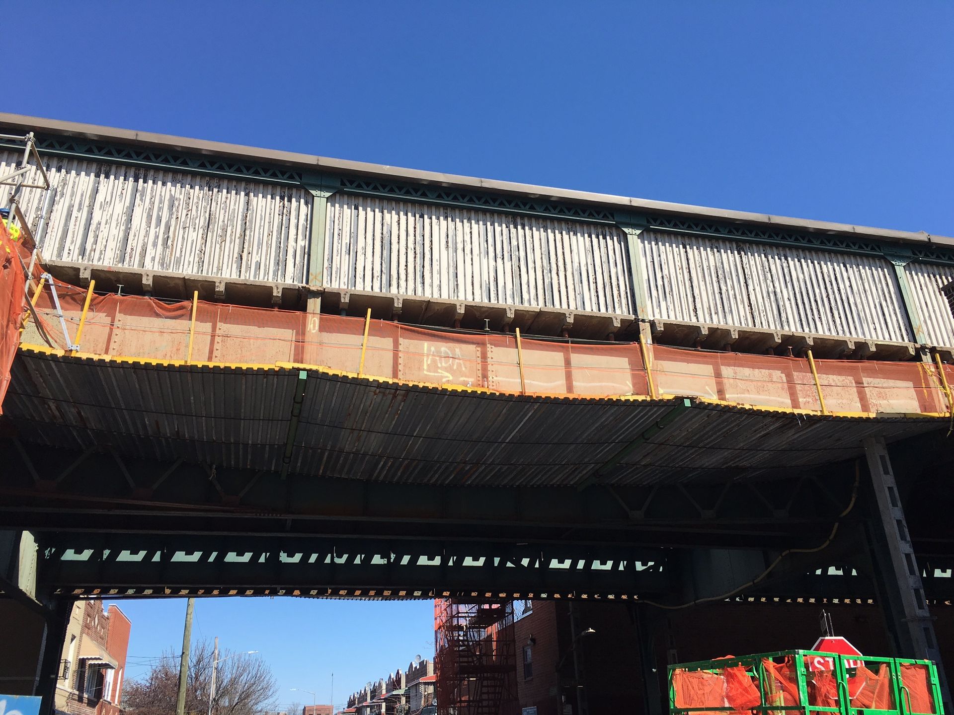 Subway train station platform maintenance painting coating wood and concrete.