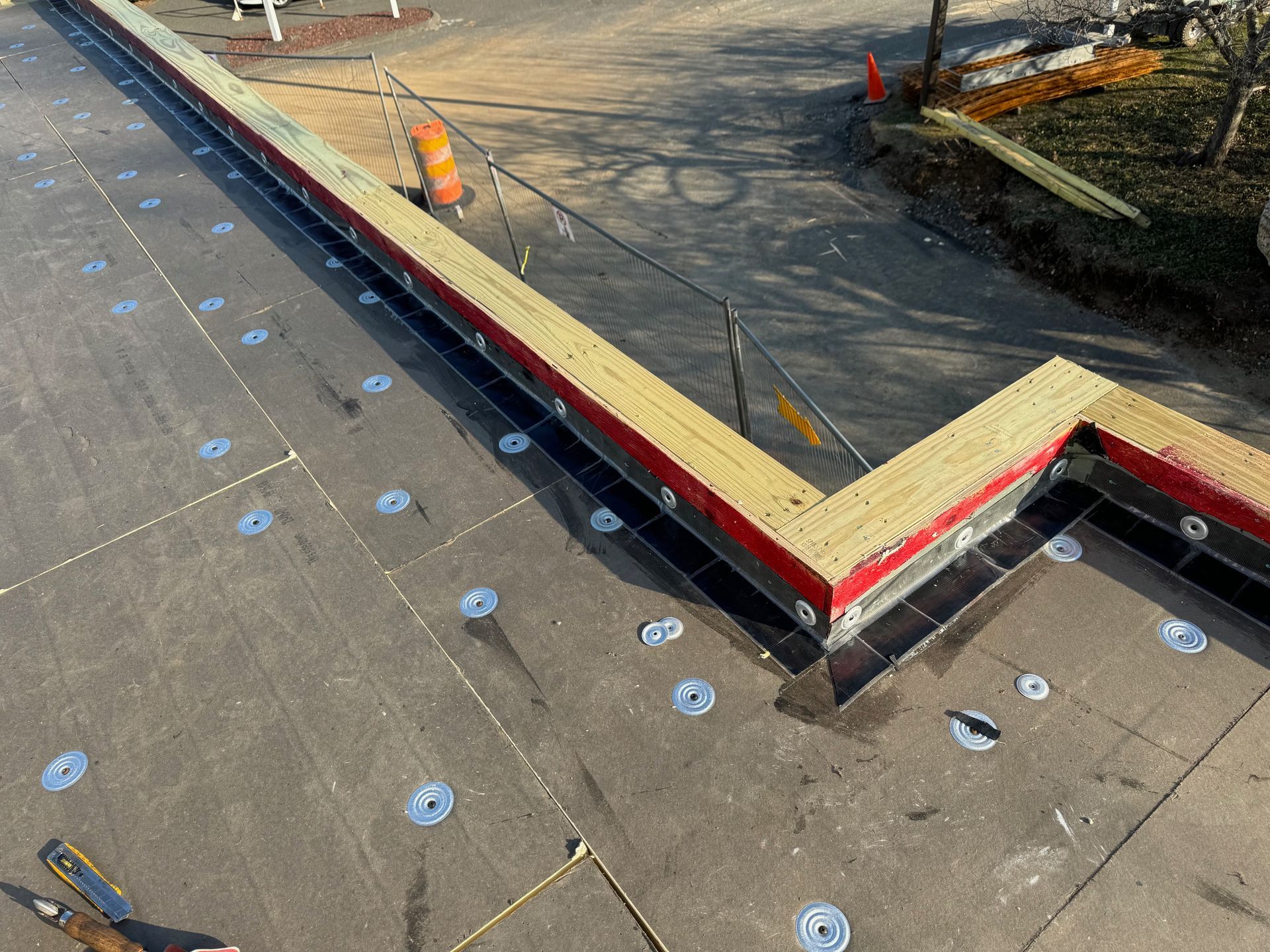 An aerial view of a roof under construction.