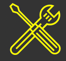 A wrench and screwdriver crossed over each other on a black background.