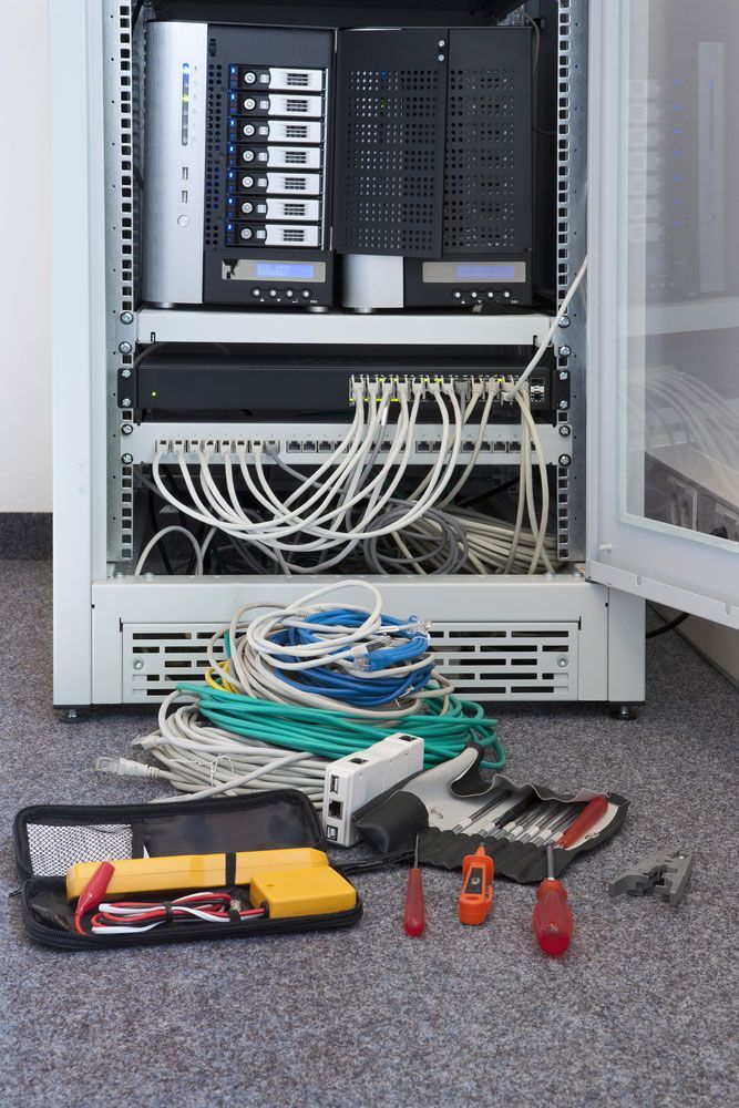 Network Installation With Tools On The Floor — 7E Integrated Services In Maitland NSW