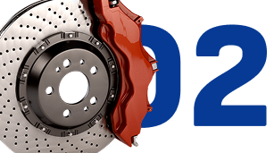 Brake rotor with red caliper in front of blue “02” text