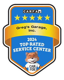 CARFAX 2024 Top-Rated Service Center badge for Greg's Garage, Inc. Features a smiling fox mascot and five gold stars. | Greg's Garage