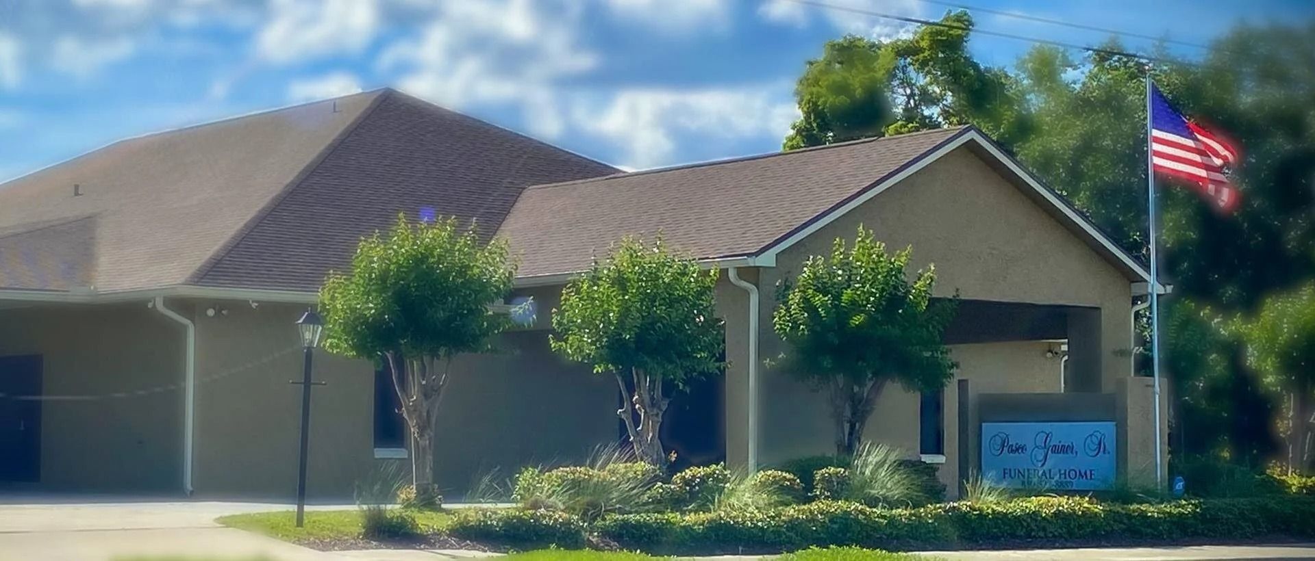 A church with a cross on the front of it