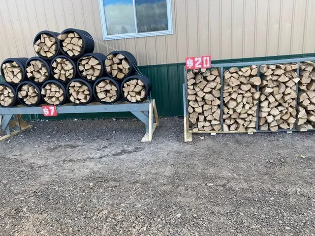 A bunch of logs are stacked on top of each other