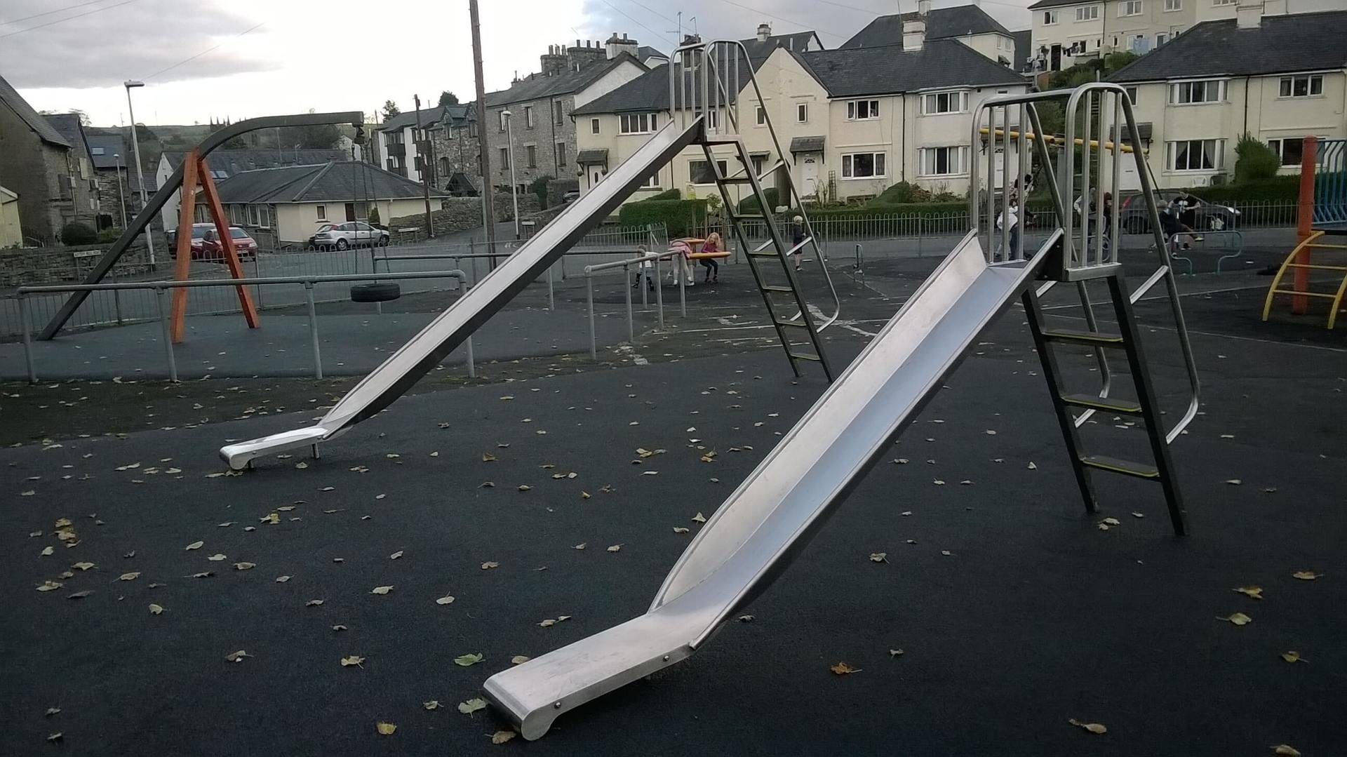 Two Metal Playground Slides