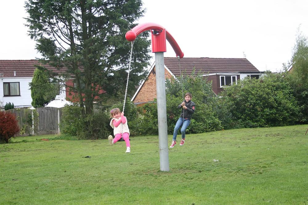 Children on Playground Swing