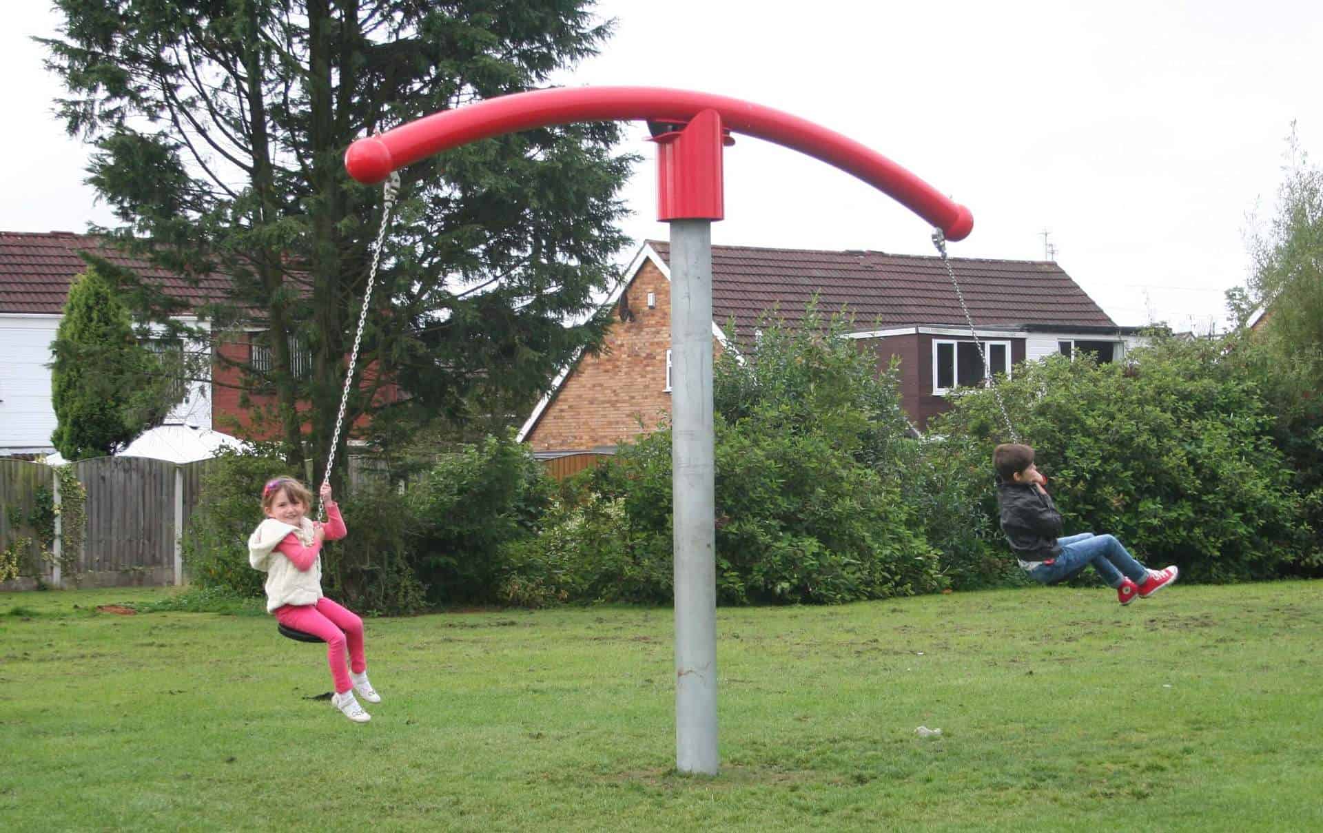 Child on Metal Playground Swing