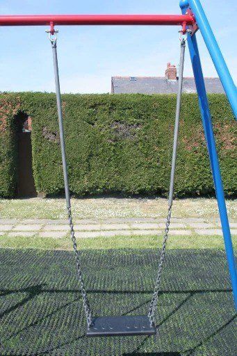 Multi-colured Playground Swing