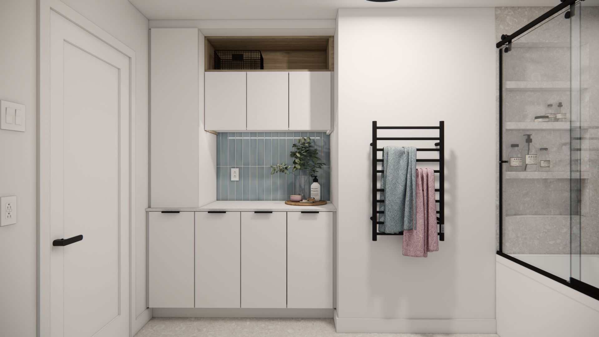 Une salle de bains moderne avec des meubles blancs, une douche en verre et un porte-serviettes noir.