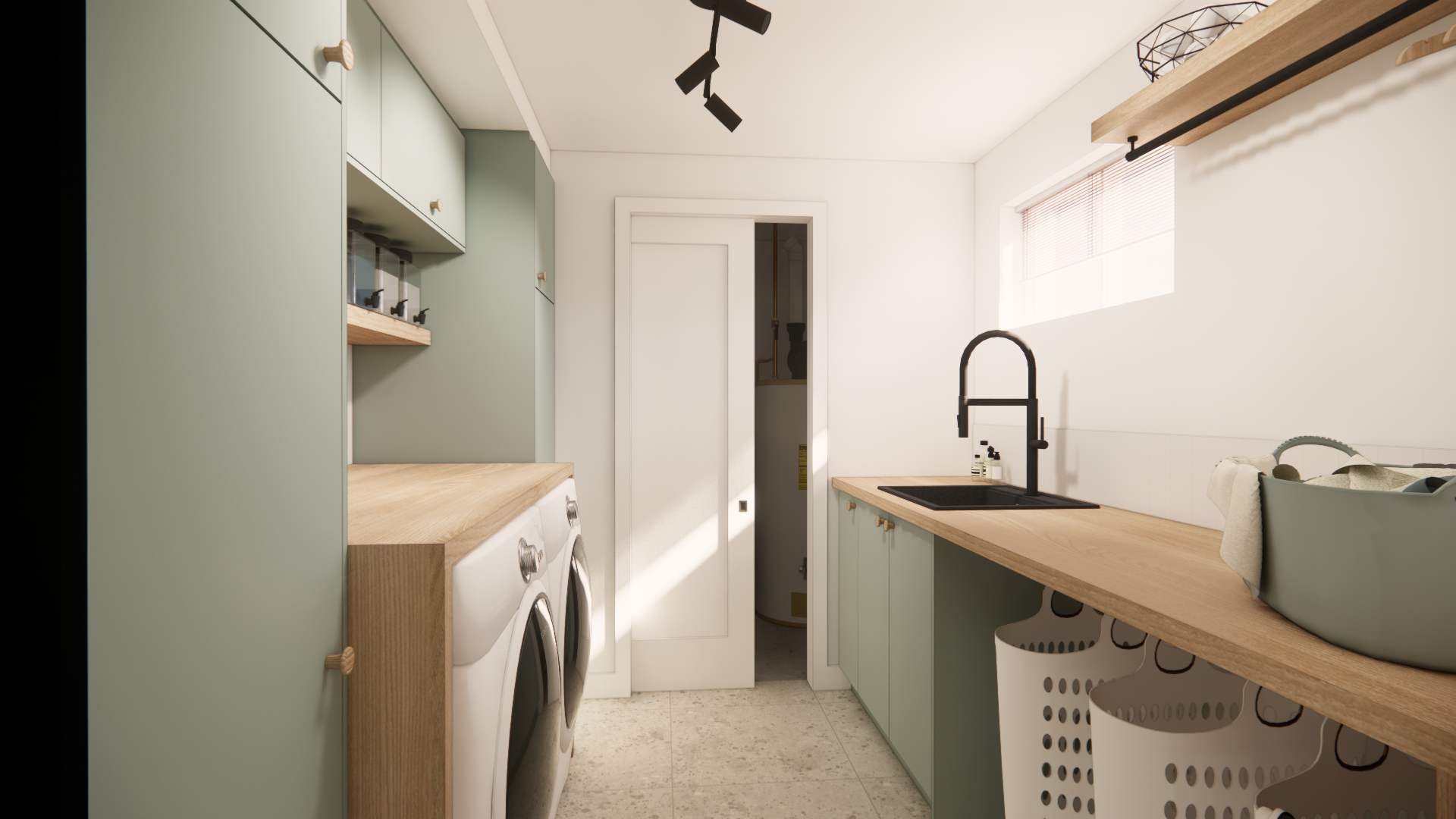 Une buanderie moderne avec des placards verts, des plans de travail en bois et un robinet noir.