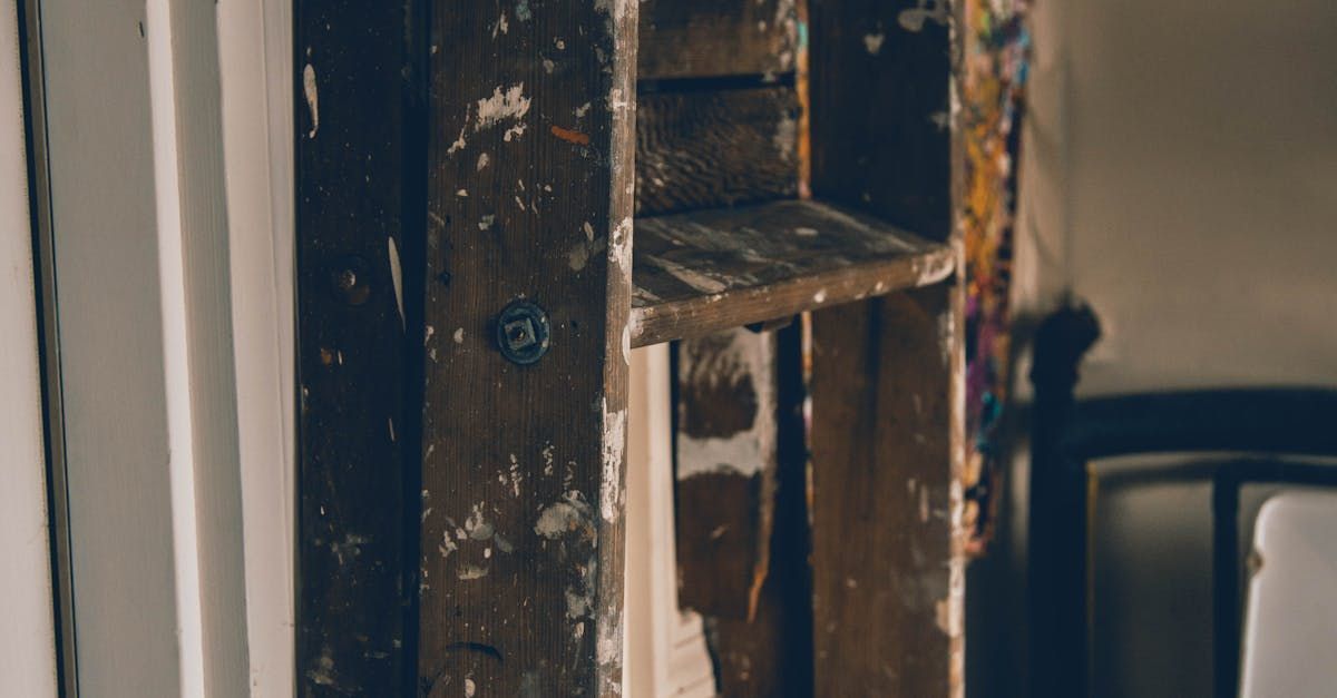 A close up of a wooden shelf in a room.