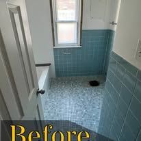 A bathroom with blue tiles and a window before being remodeled.