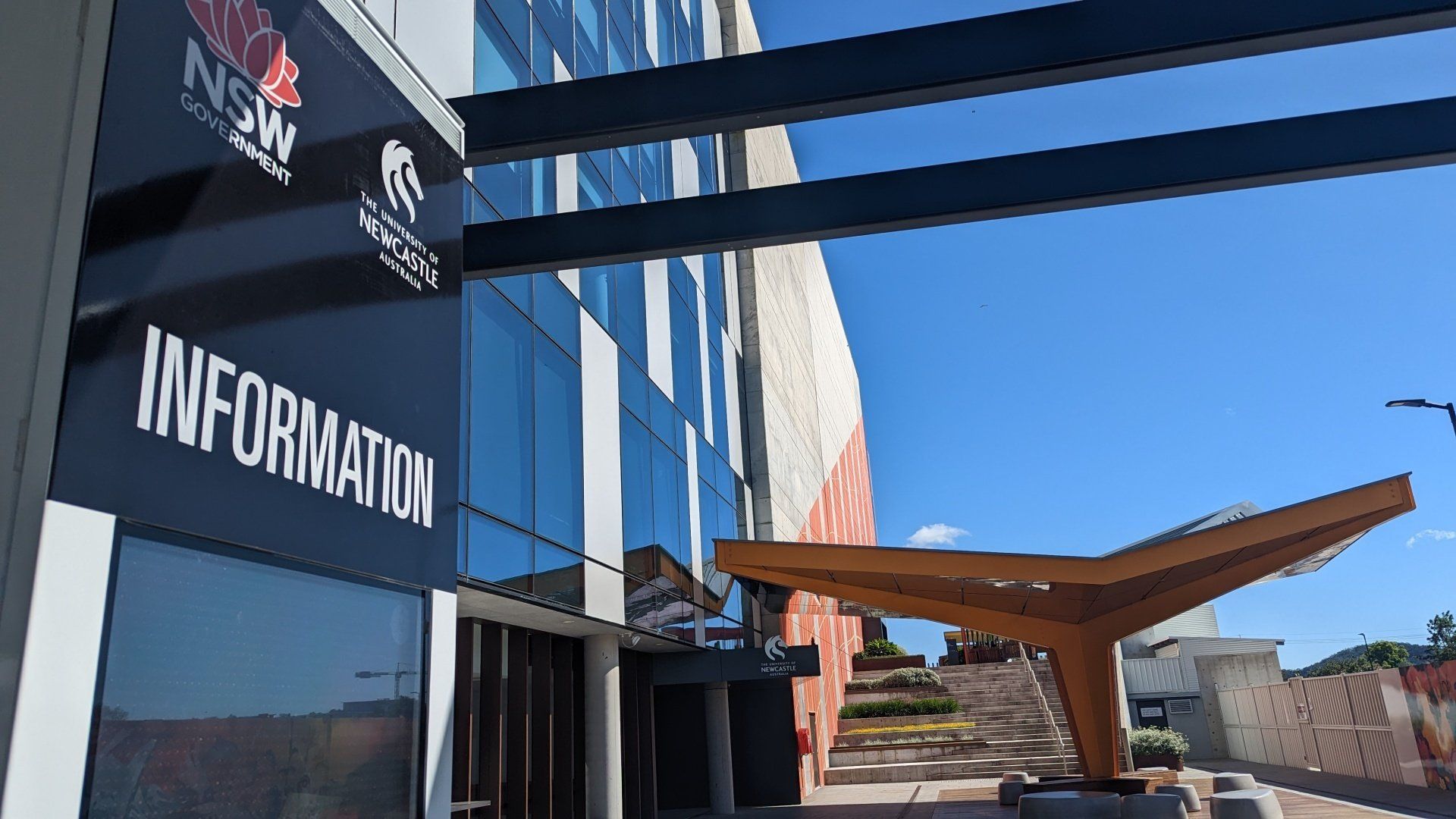 A building with a sign that says information on it