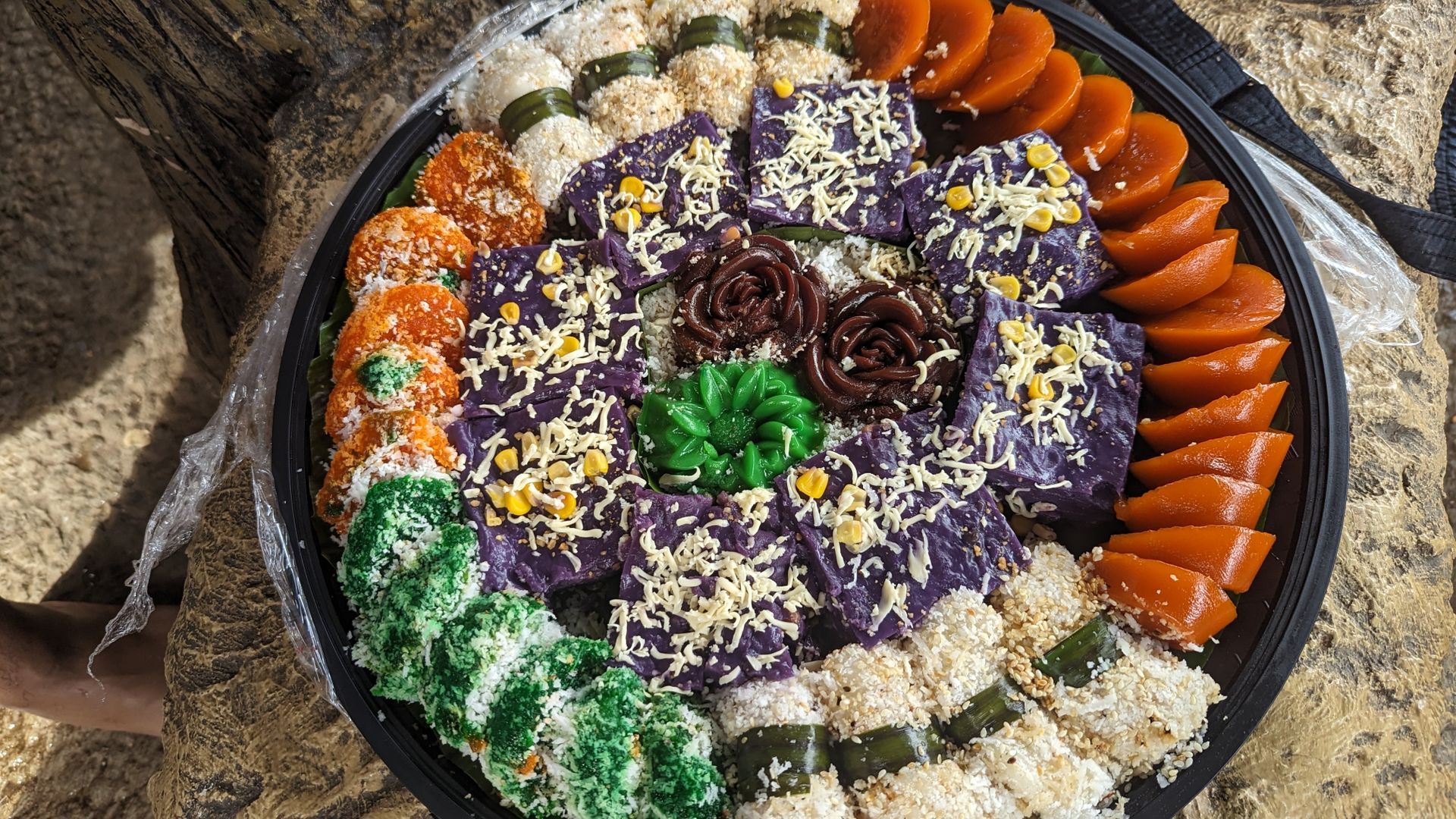 A plate of food with a lot of different types of food on it.