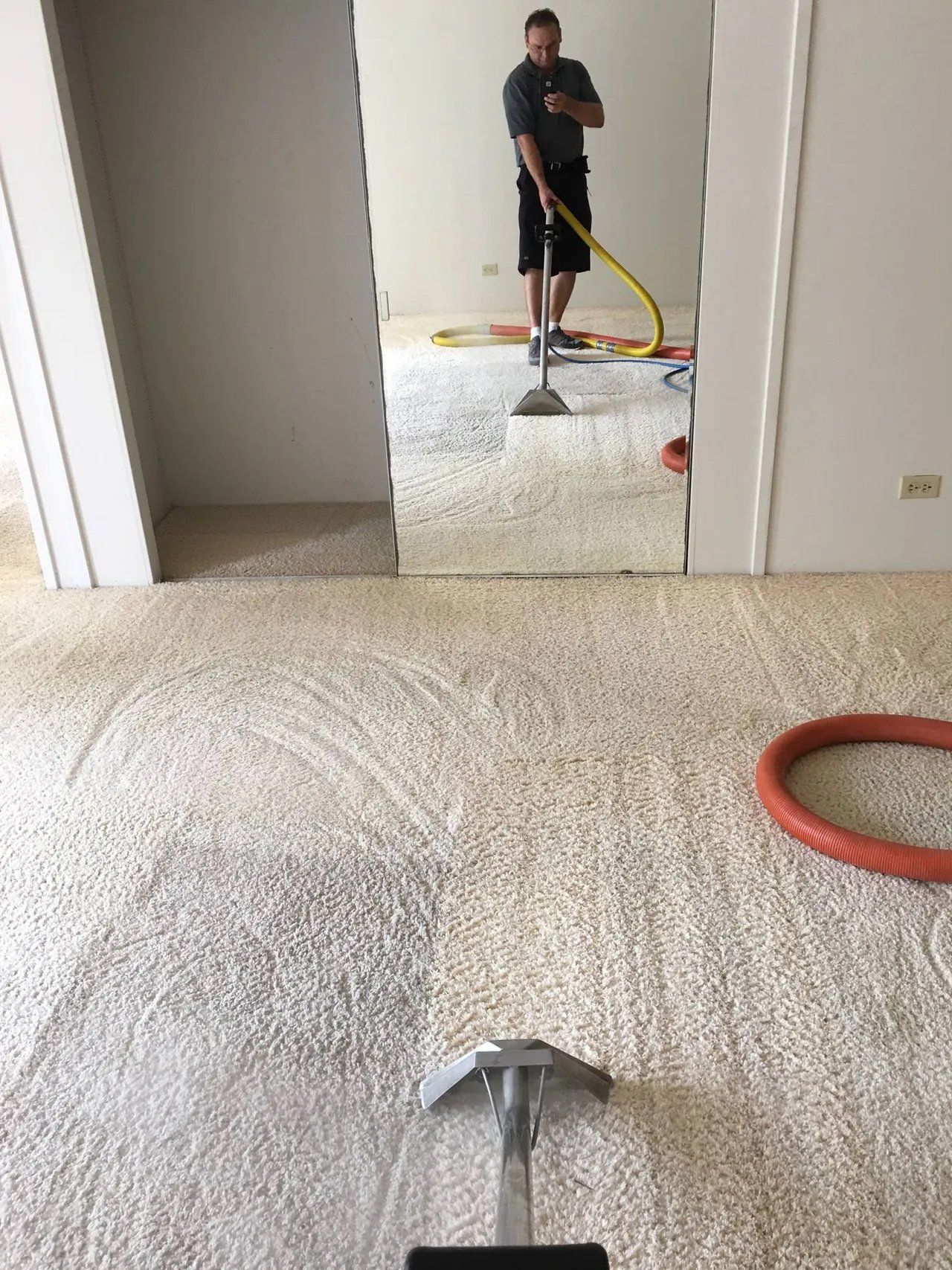 Man cleaning a couch — Oahu, HI — Advantage Carpet Care LLC