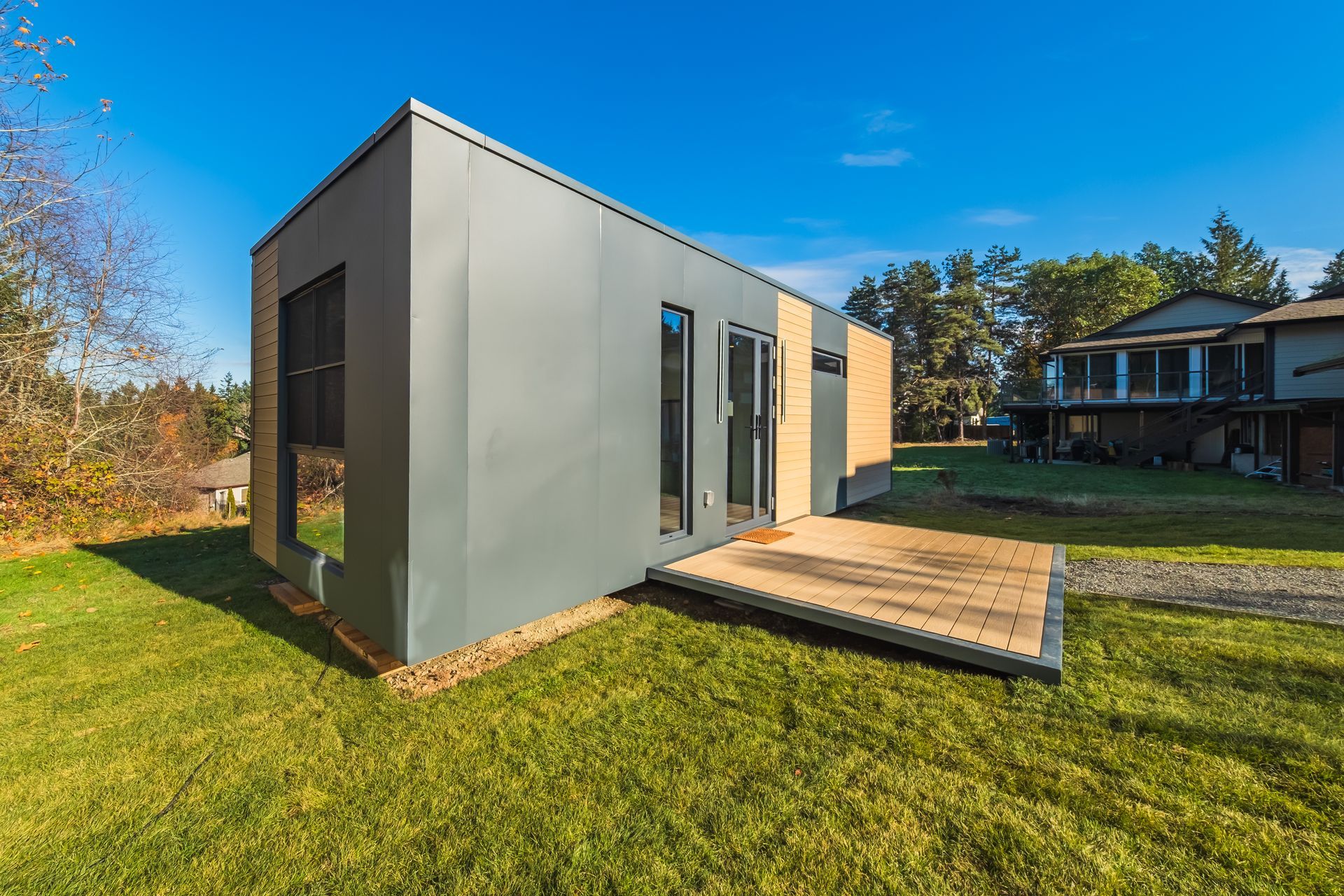 A model of a house and a model of a house on a white background.