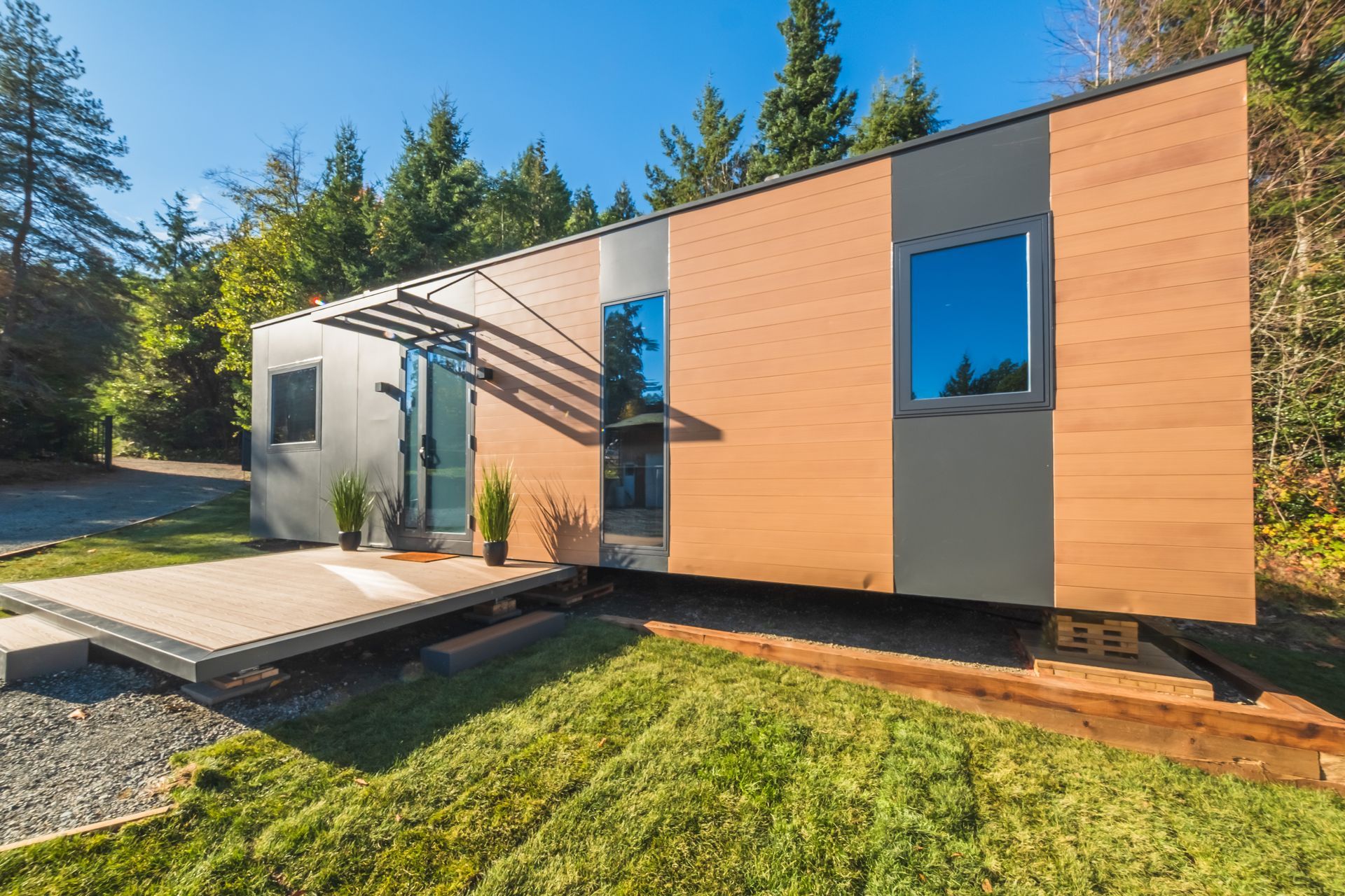 A model of a house and a model of a house on a white background.